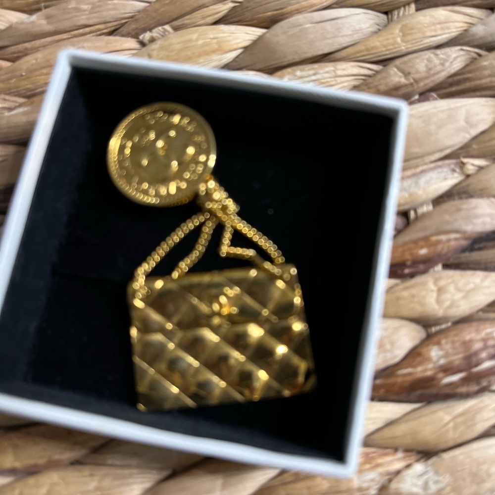 Chanel medallion handbag brooch